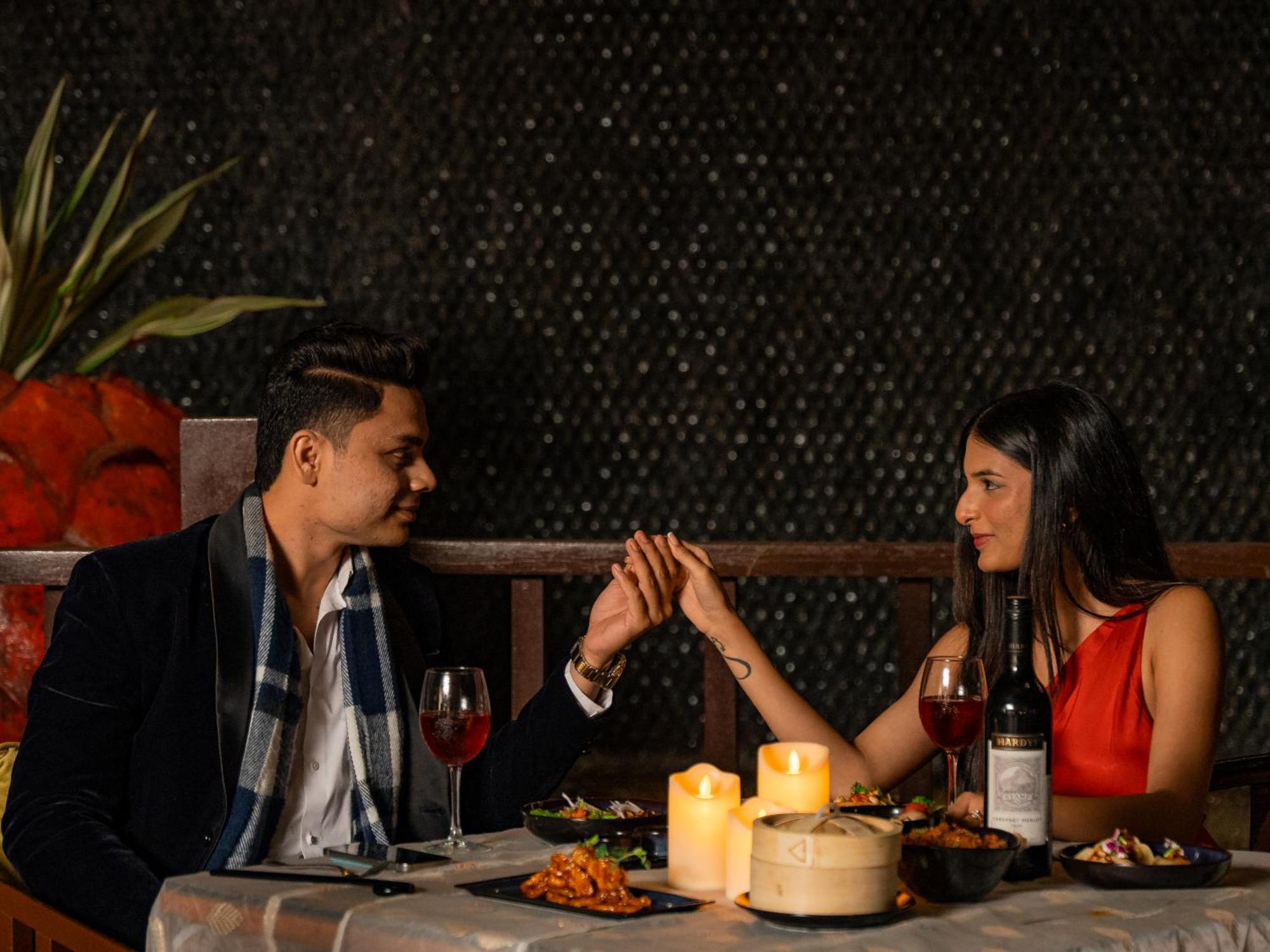 Hyatt Pune Exterior photo A couple dining together