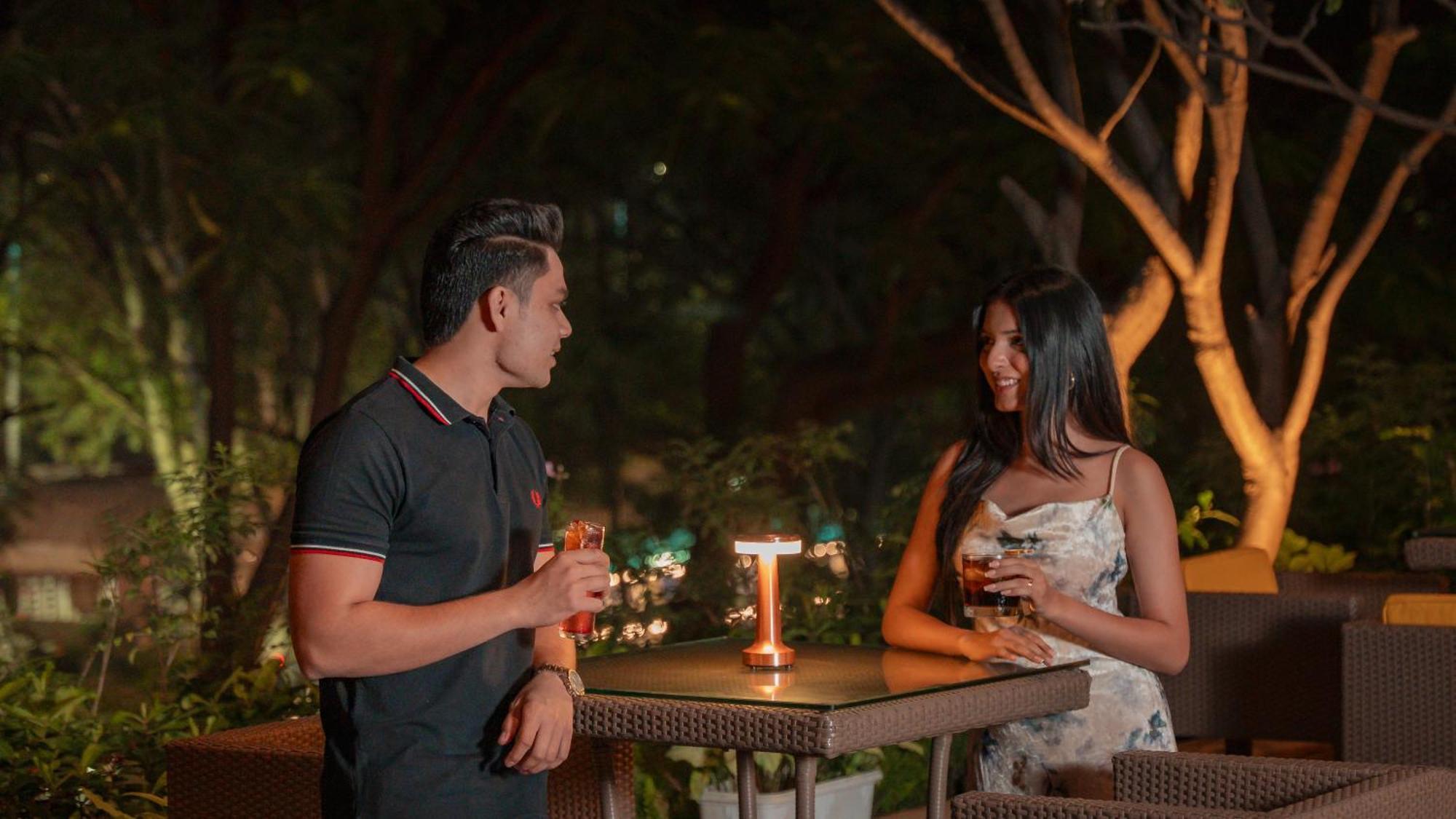 Hyatt Pune Exterior photo A couple at a bar