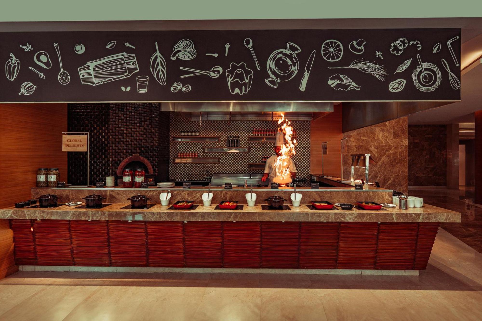 Hyatt Pune Exterior photo A live kitchen at a hotel