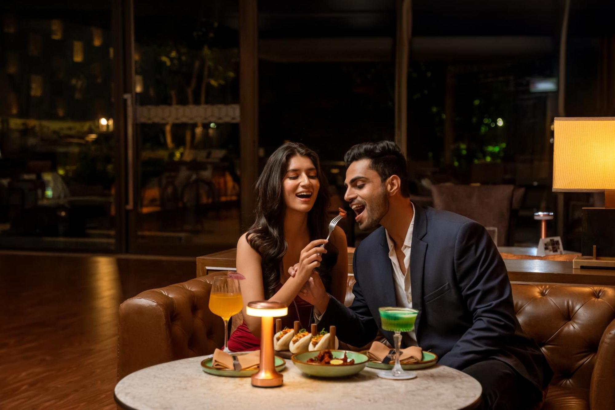 Hyatt Pune Exterior photo A couple dining at a restaurant