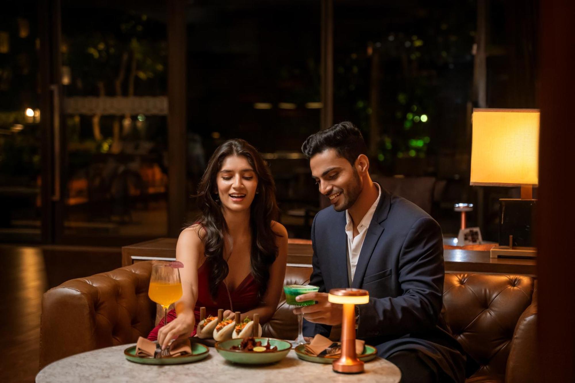 Hyatt Pune Exterior photo A couple dining at a restaurant