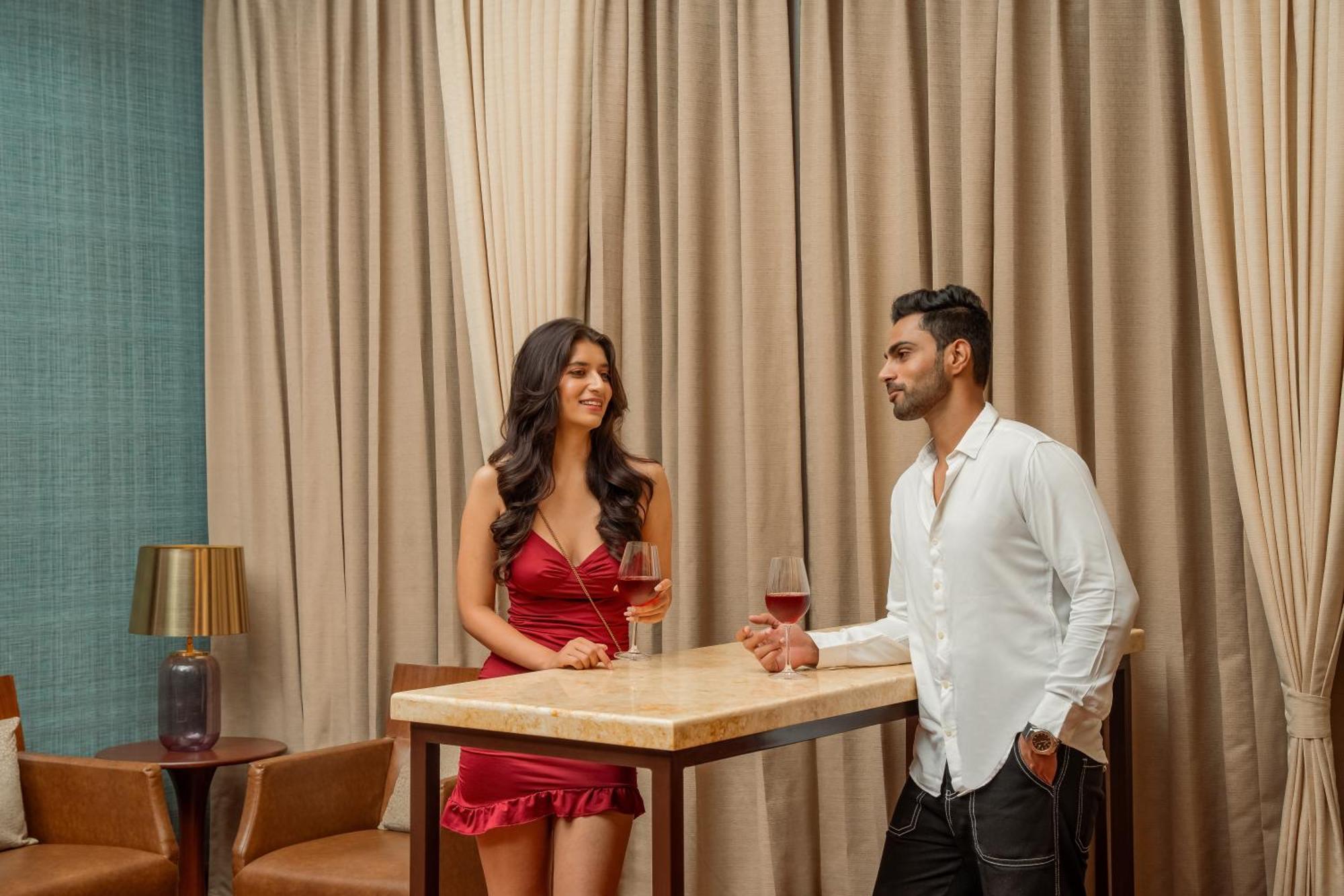 Hyatt Pune Exterior photo A couple at a bar