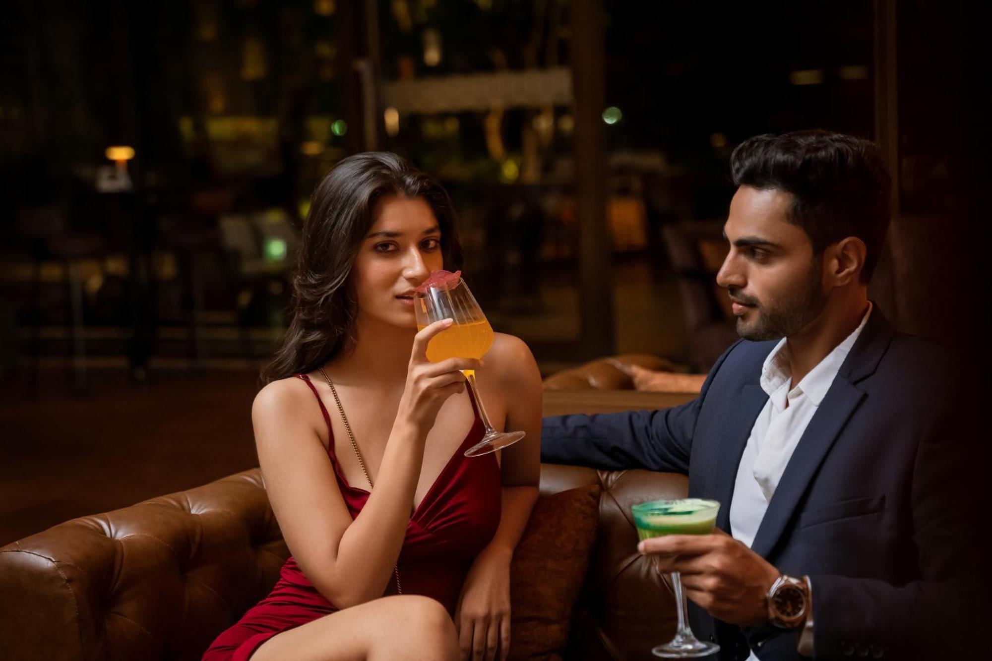 Hyatt Pune Exterior photo A couple drinking cocktails