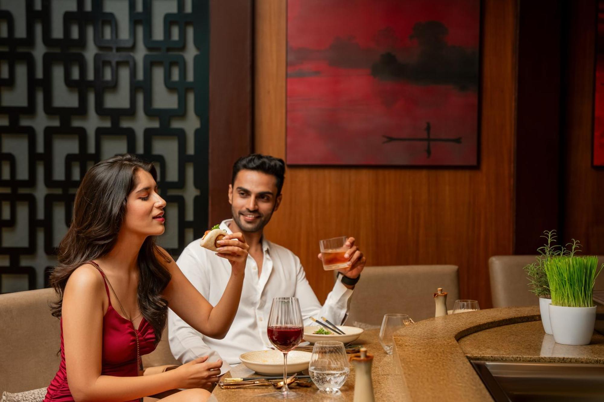 Hyatt Pune Exterior photo A couple dining at a restaurant